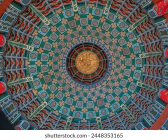 Upward view of ornate dome in Temple of Heaven shrine Chinese building - Powered by Shutterstock