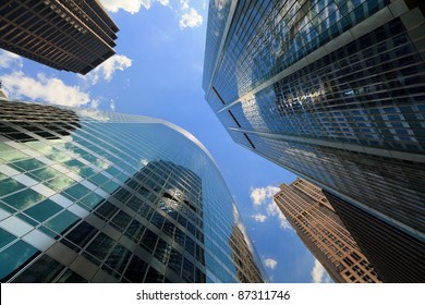 Upward view of tall skyscrapers in downtown Chicago. - Powered by Shutterstock