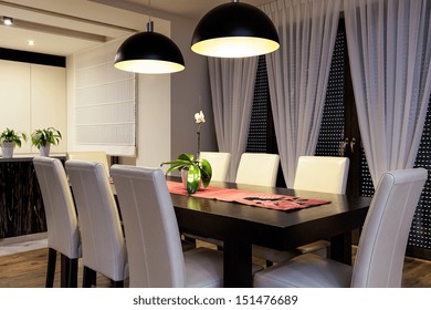 Urban Apartment - Wooden Table In A Dining Room