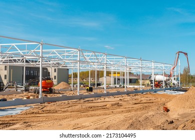 Urban Area With Machinery, People Are Working On Construction Site.Telsiai,Lithuania 05-10-2022.