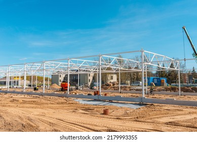 Urban Area With Machinery, People Are Working On Construction Site.Telsiai,Lithuania 05-10-2022.