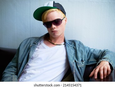 Urban Attitude. Attractive Young Blond Guy Wearing Street-style Clothing And A Smirk.