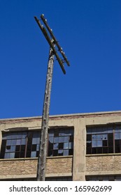 Urban Automotive Blight Telephone Pole - Abandoned Automotive Factory - Worn, Broken And Forgotten