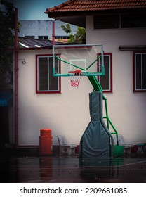 Urban Basketball Court With No People. Rainy Day Street.