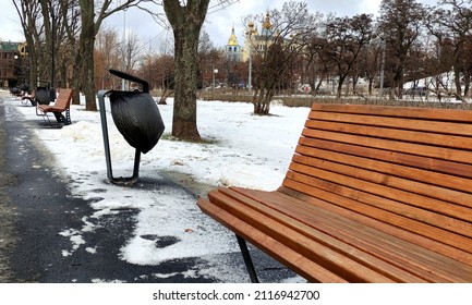 Urban Bench In The Park In Winter, Urban Urn On The Avenue In The Park, A Trash Can From Black Plastic In Urban Urn, Winter In The City, Wooden Bench 