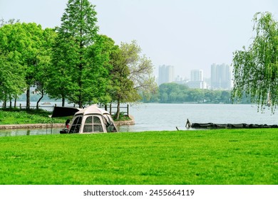 Urban Camping by the Lake in a Green City Park - Powered by Shutterstock