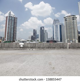 Urban  Carpark On City Background.