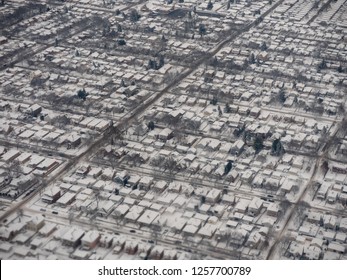 Urban City Blocks In The Midwest With A Fresh Coat Of Snow. Slushy Roads Waiting To Be Plowed. Single Family Homes With Alleyways In Back