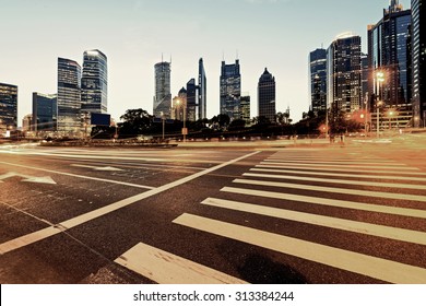 Urban City At Night With Traffic And Night Skyline