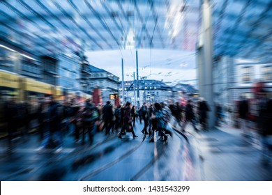 Urban City View Of People Crowd Walking Outside Of Bus Station - Concept Of Modern, Rushing, Urban, City Life, Business, Shopping - Focus On Center Pedestrians Feet - Defocused Radial Effect