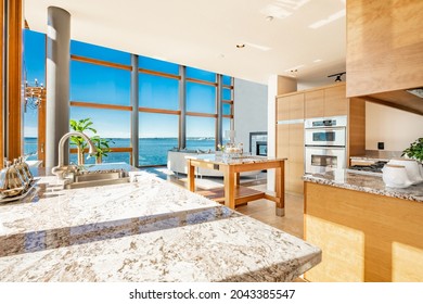Urban condo with floor to ceiling windows and ocean view