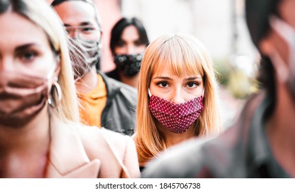 Urban Crowd Of Citizens Walking On City Street Covered By Face Mask - New Normal Society Concept With People On Worried Anxiety Mood - Selective Focus On Blonde Woman - Warm Contrast Filter