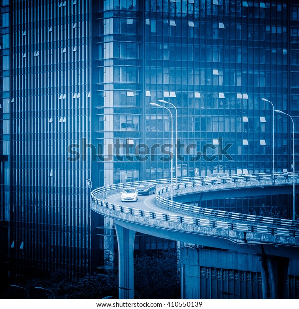 urban\
curved viaduct of chongqing,blue toned\
image.