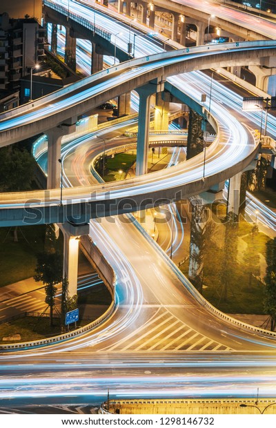 Urban elevated road junction and
interchange overpass at night in Chengdu,
China