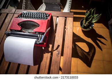 Urban Home Terrace With 1970s Typewriter. The Blank Page Challenge Concept