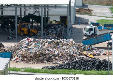 Urban landfill built with EU funding. Program Environment . Waste treatment plant depot, preparing it for separation. Waste disposal, management, reuse, recycle and recovery concept.
