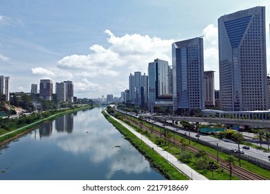 Urban landscape with river, marginal roads, cars and buildings. Marginal Pinheiros, Sao Paulo, Brazil - Shutterstock ID 2217918669