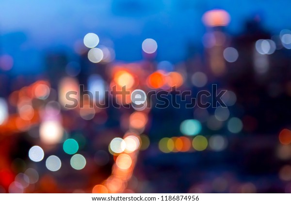 Urban lights bokeh image, defocused city
lights background
