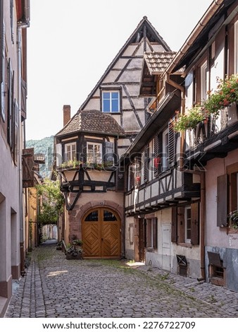 urban medieval landscape of alsace, france, with its old half-timbered houses and its water channel