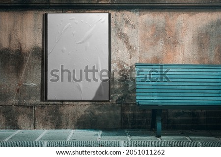 Urban Mock up white paper billboard or poster in a frame on a wall background