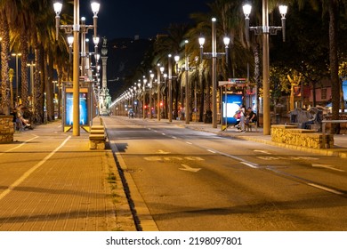 Urban Night City Life In Barcelona, Illuminated Streets With Cars. Traffic On The Avenue With Light.  Barcelona, Spain - May 14, 2022