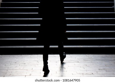 Urban Night Walk : Blurry Silhouette Of Young Elegant Independent Woman Climbing Up The City Street Public Stairs In The Peaceful Moonlight , Alone, From Behind