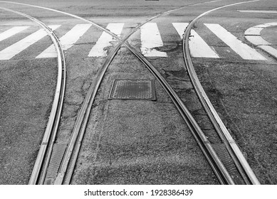 Urban railroad of Milan's tram (an urban mean of transport) splitting in two directions. Left or right? Monochromatic with copy-space