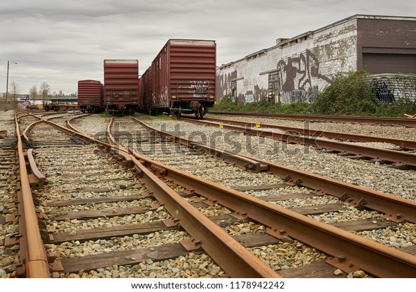     Urban
Railroad Tracks and Cars. Railroad tracks running through an urban
centre.

                         
