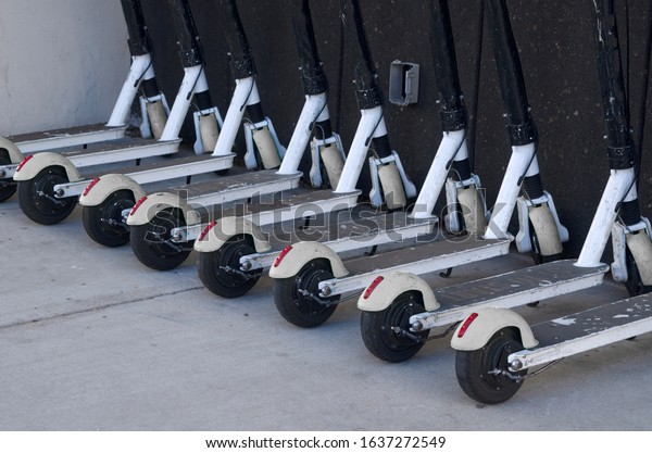 urban rental scooters in the\
city