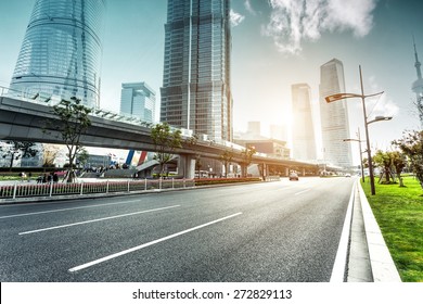 Urban Road And Modern City Skyline 