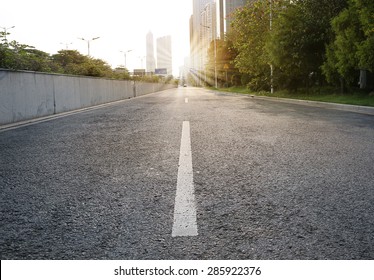 Urban Road With Sunset