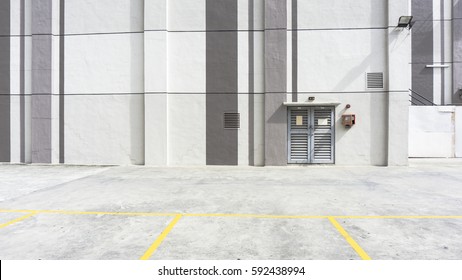 Urban Rooftop Carpark On City Background