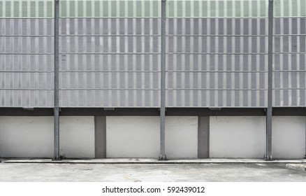 Urban Rooftop Carpark On City Background