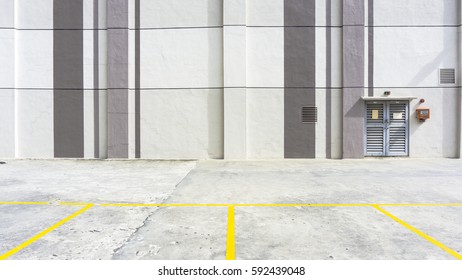 Urban Rooftop Carpark On City Background