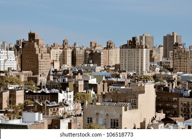 Urban scene of high rises in Lower Manhattan viewed from a Chelsea rooftop