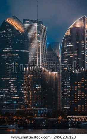 Urban skyscrapers in Shanghai at night; 