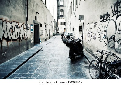 Urban slum. Narrow Italian street. High contrast effect. - Powered by Shutterstock