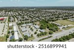 Urban sprawl master planning mixed-use development area along Keller Parkway, Farm to Market Road 1709 in downtown Keller, Texas, residential houses, commercial buildings suburbs Dallas, aerial. USA