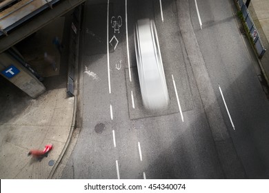     Urban Street Downtown. Overhead View Of A Big City, Urban Street. Slow Shutter Speed Creates The Motion Blur.

                          