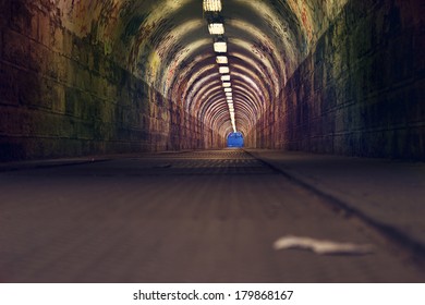 urban underground tunnel with graffiti and light - Powered by Shutterstock