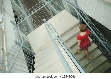 Urban Woman Walking Up Stairs.