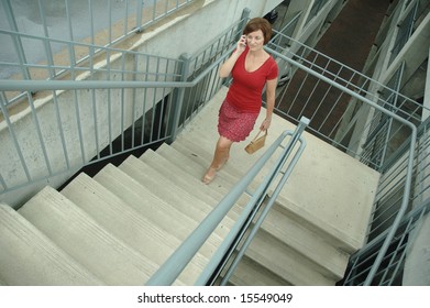 Urban Woman Walking Up Stairs.