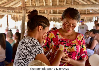 Uribia, Guajira/ Colombia; 07/19/2019: Wayuu Girls Preparing The Symbols Of Their Indigenous Caste.