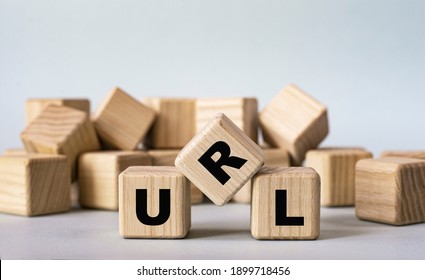 URL (Uniform Resource Locator) - Acronym On Wooden Cubes On A Light Background. Business Concept