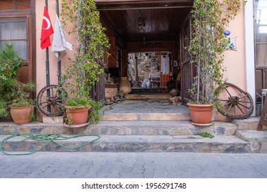 Urla, Izmir, Turkey - 03.08.2021: Small Hostel And Hotel Entrance With A Historical Gate And Turkish Flag