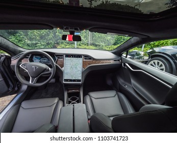 URMOND, NETHERLANDS - MAY 31, 2018: Leather luxury Interior of electric car TESLA Model S 100D. Tesla Motors Assembly Plant in Tilburg, Interior Tesla car.