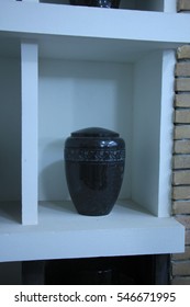 Urn With Ashes In A Columbarium Wall