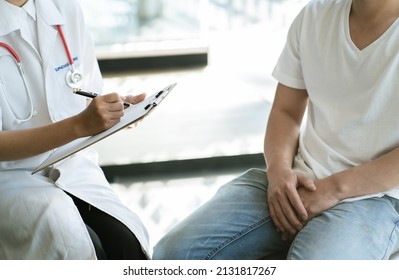 Urologist Doctor Giving Consult For Prostate Problems To Patient. Urologic Oncologists Specialize In Treating Cancer Of The Urinary Tract And Male Reproductive Organs.