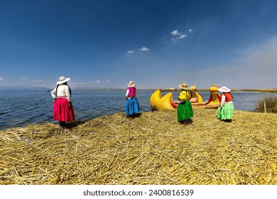 The Uros Islands are a group of artificial floating islands located on Lake Titicaca, which is situated on the border of Peru and Bolivia. The islands are home to the Uros people.