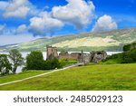 Urquhart Castle is a ruined castle that sits beside Loch Ness in the Highlands of Scotland.